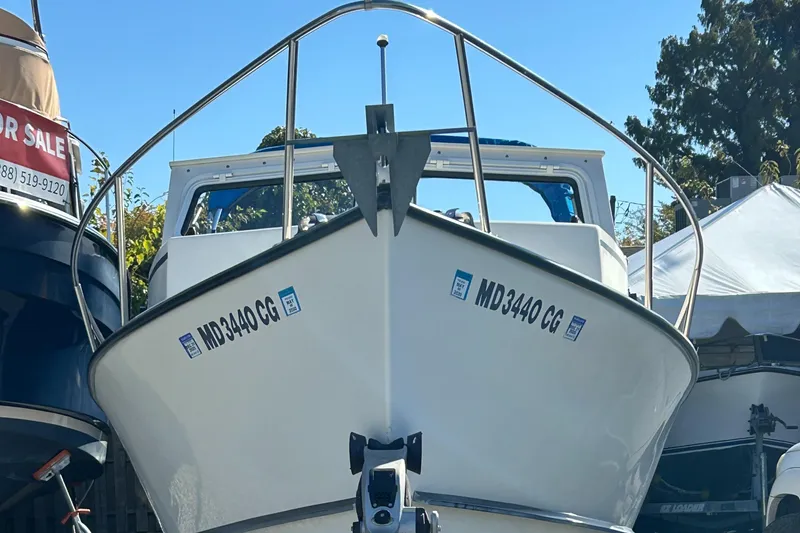 Slide: The Image of 2014 Seaway 21 Seafarer Cuddy boat with registration MD3440CG, displayed for sale. - 4