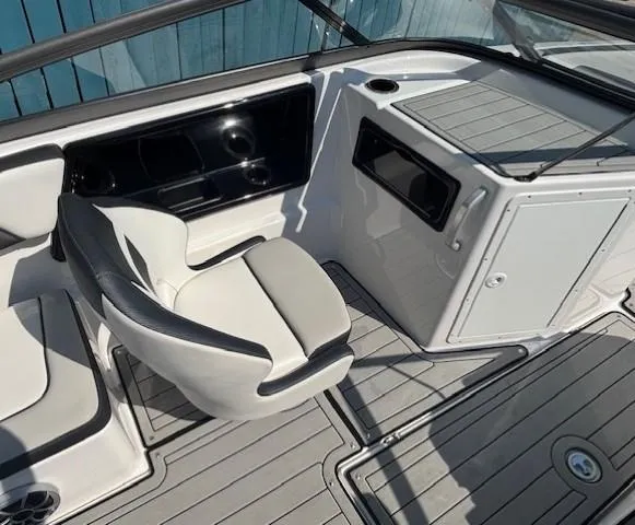 Slide: The Image of 2020 Yamaha Boats 195S interior with sleek seating and modern dashboard design. - 18