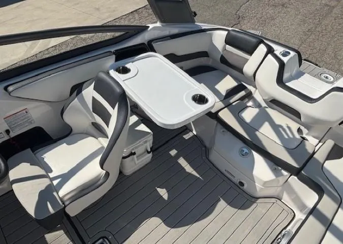 Slide: The Image of 2020 Yamaha Boats 195S interior with seating and table, featuring modern design and comfort. - 19
