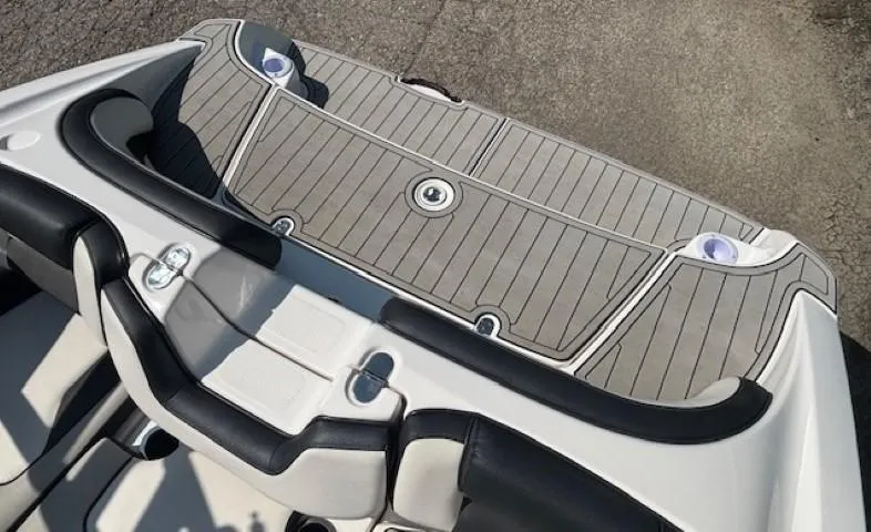 Slide: The Image of 2020 Yamaha Boats 195S interior with sleek seating and deck design. - 26