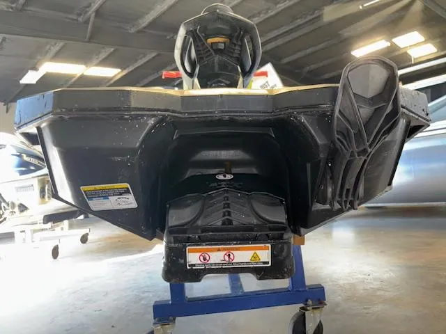 Slide: The Image of 2021 Sea-Doo SPARK TRIXX 3up jet ski on display in a showroom. - 14