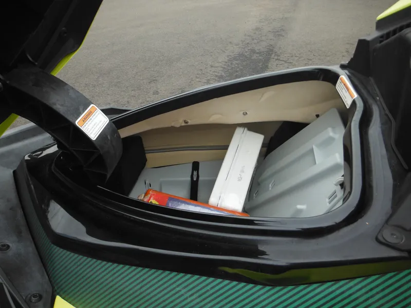 Slide: The Image of 2019 Sea-Doo GTI SE 155 storage compartment with items inside. - 19