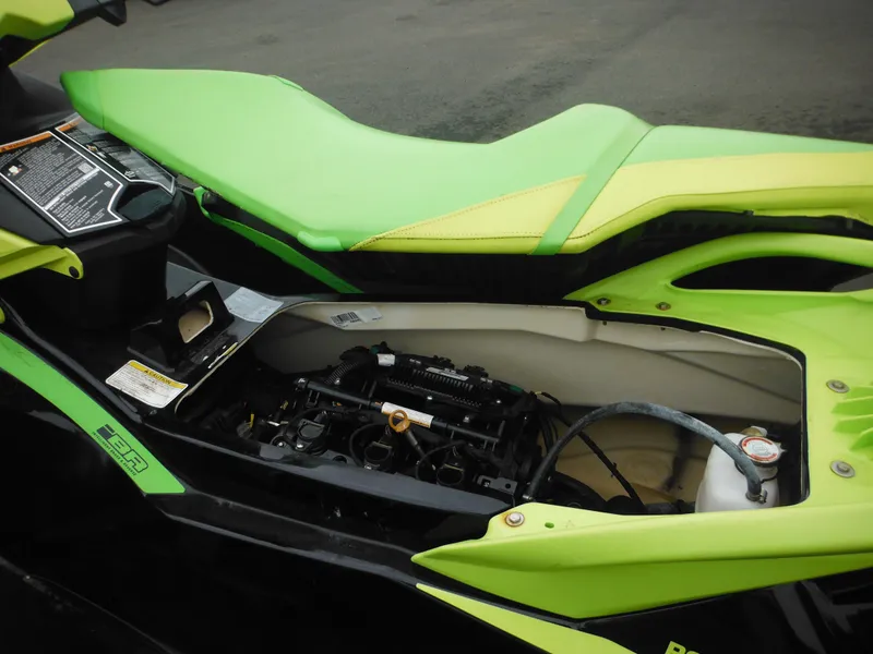 Slide: The Image of 2019 Sea-Doo GTI SE 155 with open engine compartment, showcasing internal components. - 24