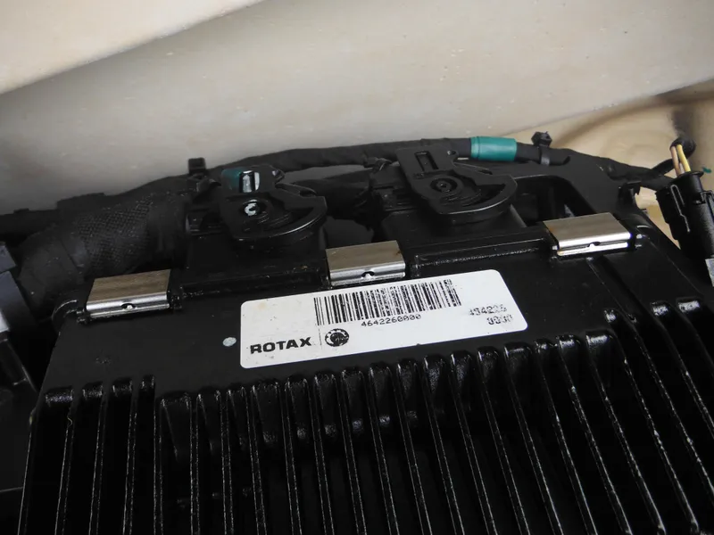 Slide: The Image of 2019 Sea-Doo GTI SE 155 engine component with Rotax branding and barcode. - 27
