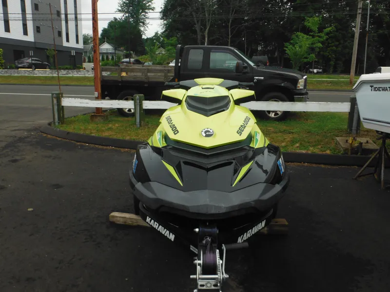 Slide: The Image of 2019 Sea-Doo GTI SE 155 jet ski on trailer, parked outdoors. - 8