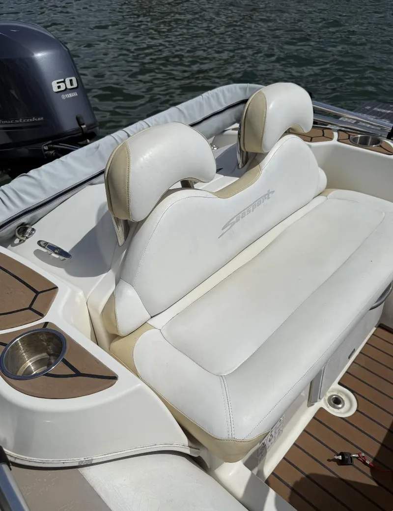 Slide: The Image of 2018 Zodiac Avon boat with white seating and Yamaha 60 outboard motor. - 3
