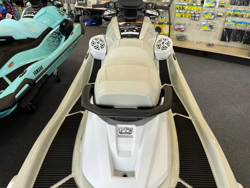 Slide: The Image of 2025 Yamaha WaveRunner VX Cruise HO in showroom, featuring sleek design and comfortable seating. - 2