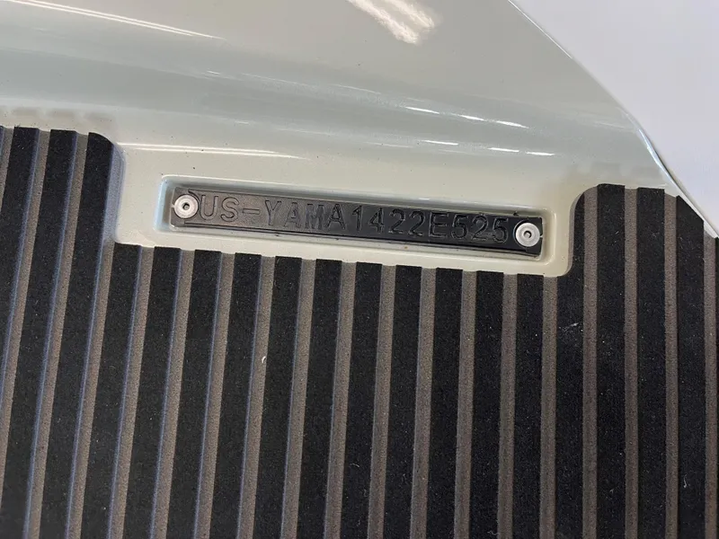 Slide: The Image of 2025 Yamaha WaveRunner VX Cruise HO identification plate on textured surface. - 7