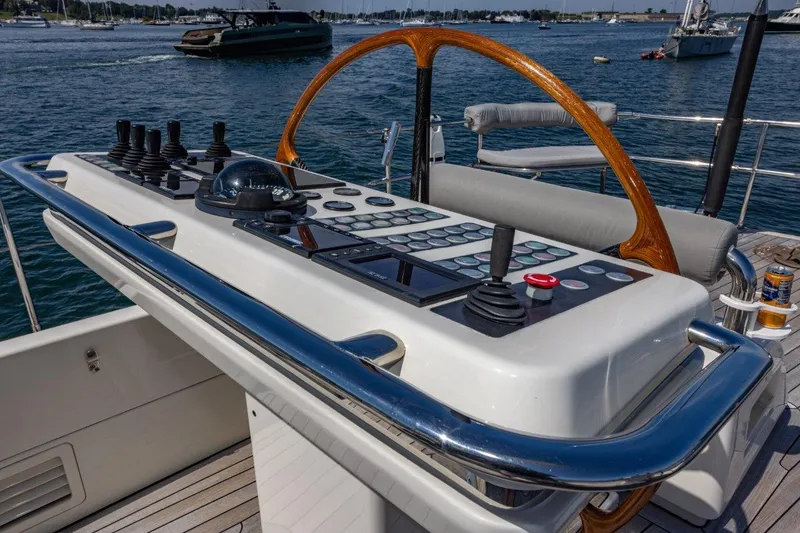 Slide: The Image of Control panel of 2003 Nautor Swan 100 Pilothouse yacht with wooden steering wheel. - 18