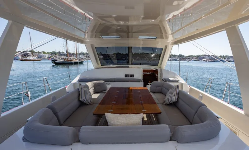 Slide: The Image of Luxurious 2003 Nautor Swan 100 Pilothouse yacht interior with elegant seating and ocean view. - 22