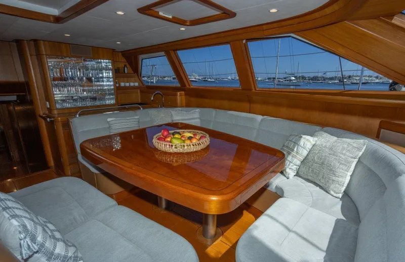Slide: The Image of Luxurious interior of 2003 Nautor Swan 100 Pilothouse yacht with elegant dining area. - 27