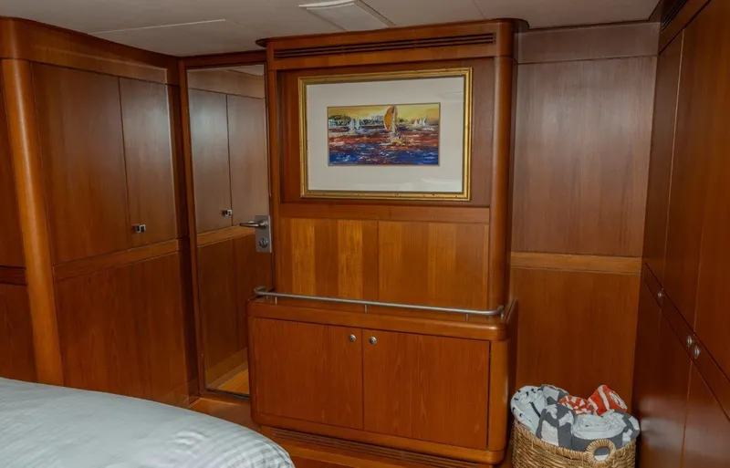 Slide: The Image of Luxurious wooden interior of 2003 Nautor Swan 100 Pilothouse with artwork and basket. - 34