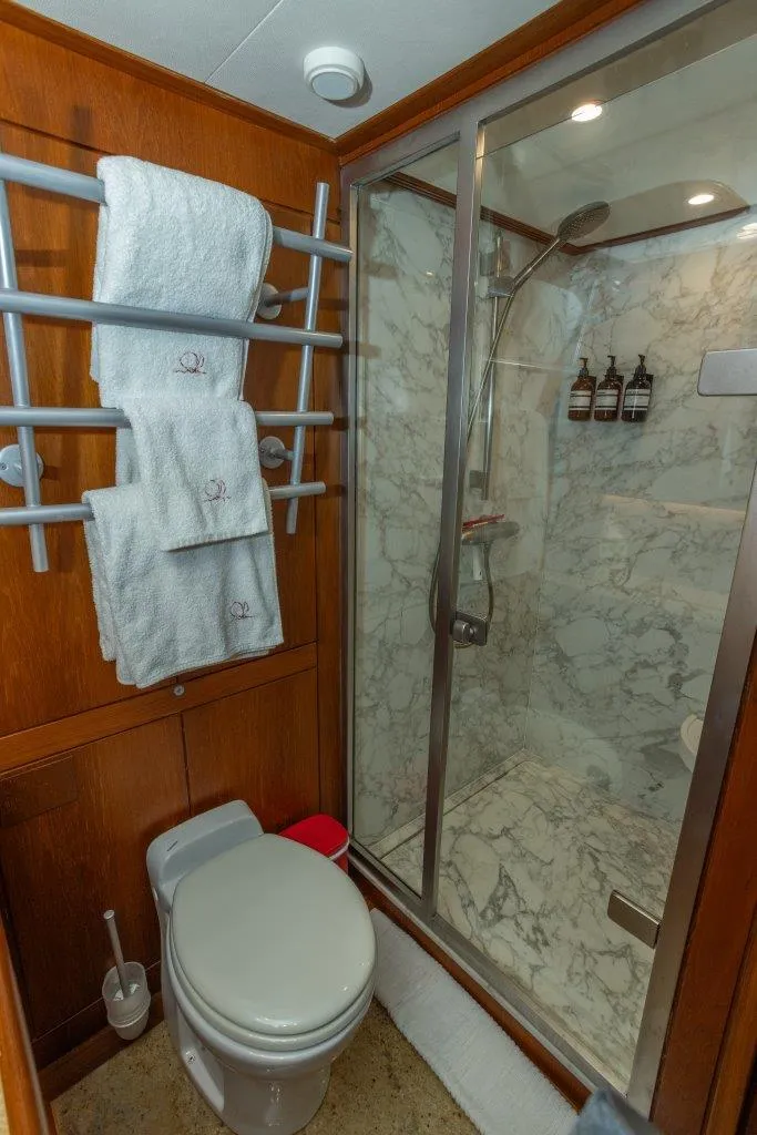 Slide: The Image of Luxurious bathroom in 2003 Nautor Swan 100 Pilothouse yacht with marble shower. - 36