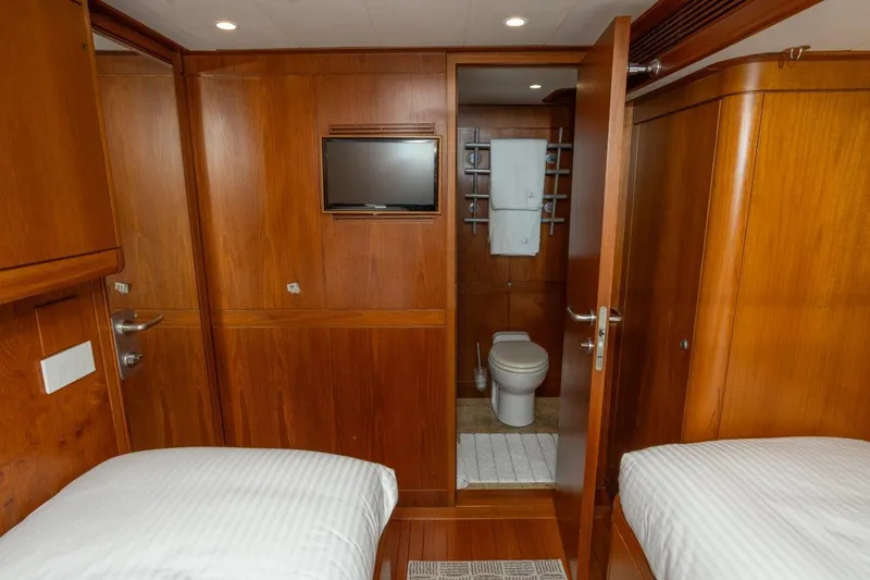 Slide: The Image of Luxurious wooden interior of 2003 Nautor Swan 100 Pilothouse yacht cabin with ensuite bathroom. - 40