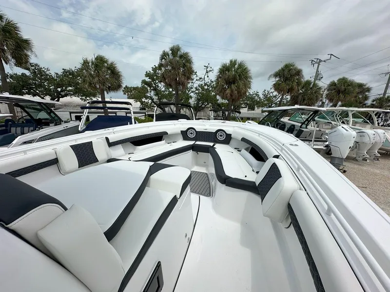Slide: The Image of 2025 Tidewater 320 CC Adventure boat seating with modern design and comfortable upholstery. - 13