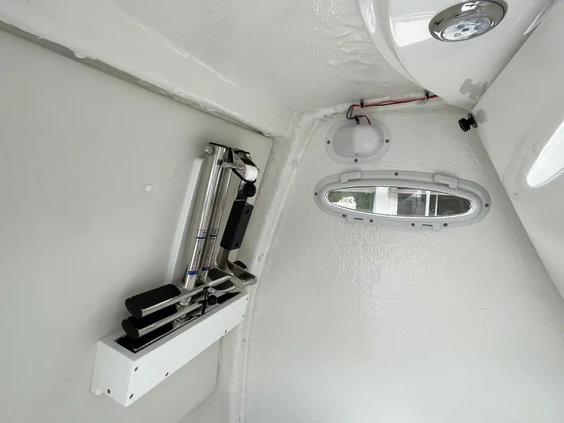 Slide: The Image of Interior view of 2026 Tidewater 282 CC Adventure boat, featuring a sleek, modern design. - 12