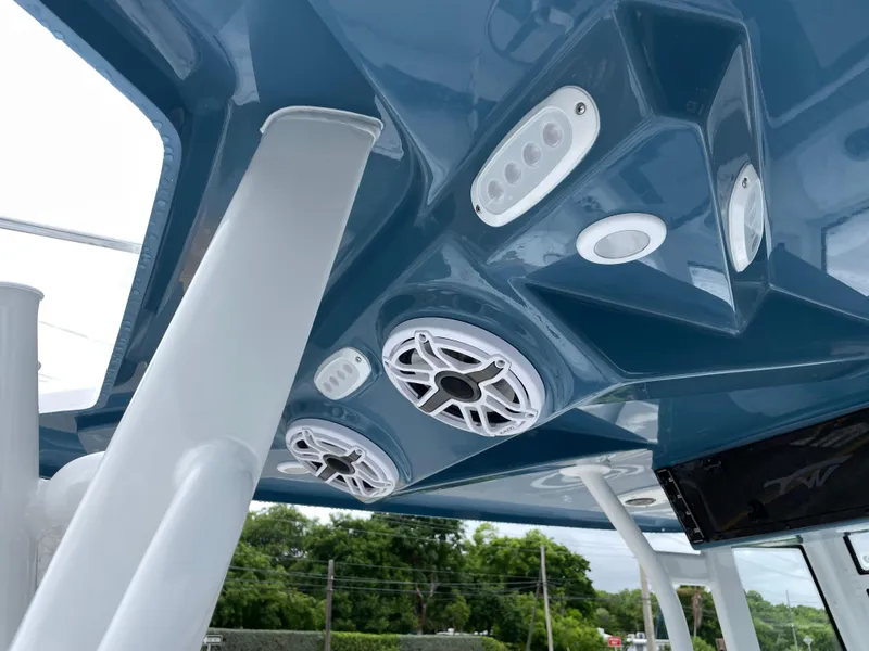 Slide: The Image of 2026 Tidewater 282 CC Adventure boat ceiling with speakers and lights. - 18