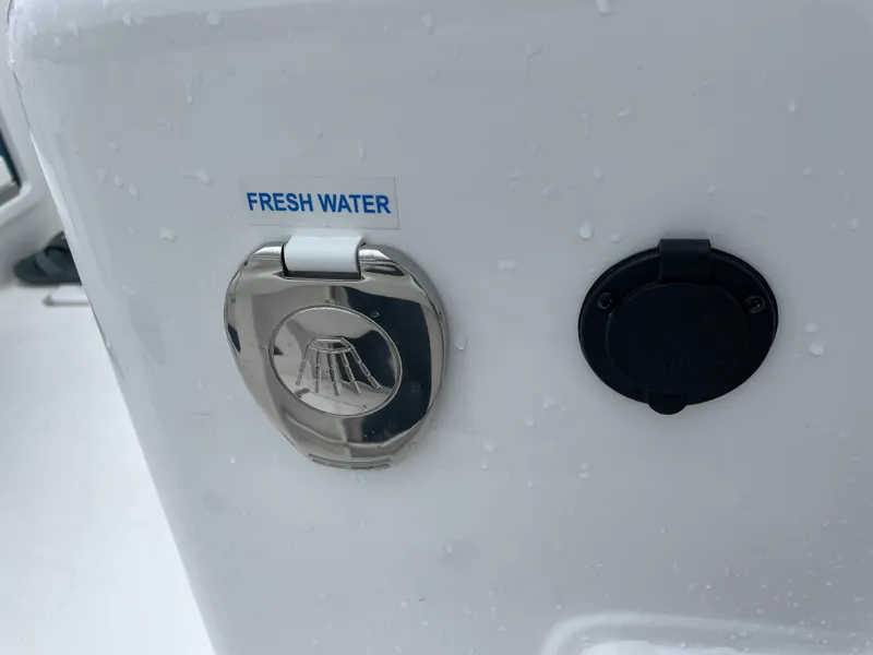 Slide: The Image of Fresh water access on 2026 Tidewater 282 CC Adventure boat. - 25