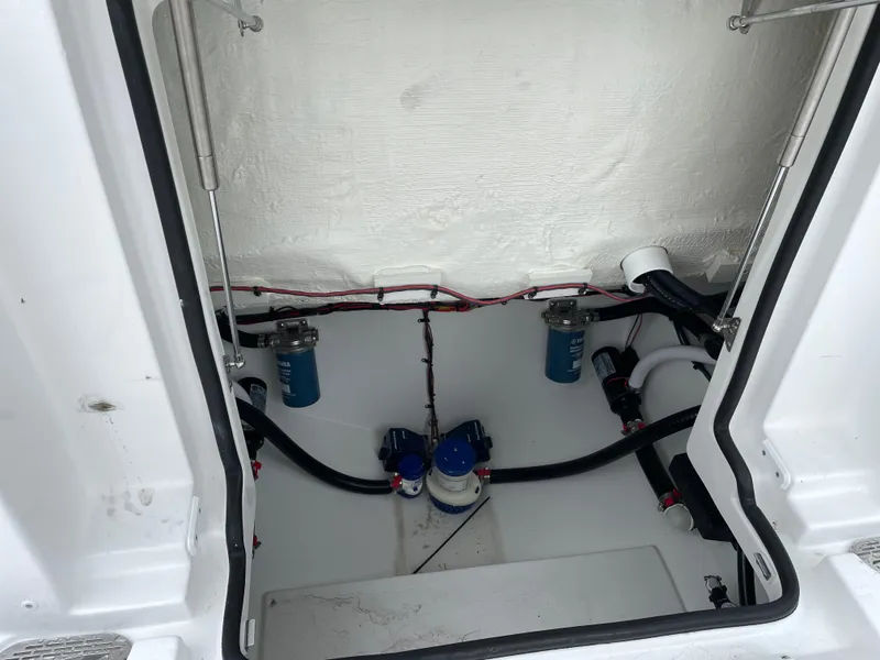 Slide: The Image of 2026 Tidewater 282 CC Adventure boat interior wiring and plumbing system. - 32