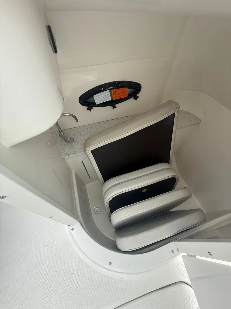 Slide: The Image of 2022 Hurricane SD 2486 boat interior with seating and storage area. - 12