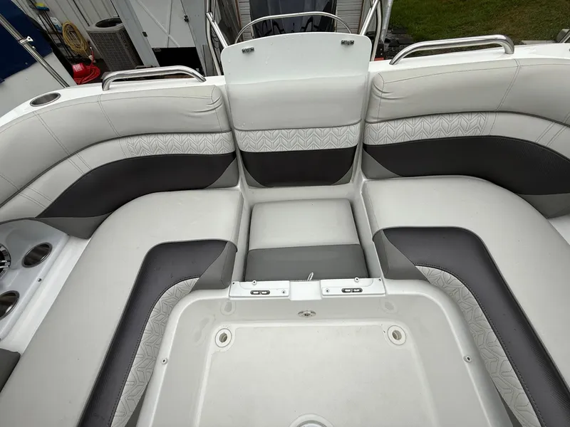 Slide: The Image of 2022 Hurricane SD 2486 boat interior with gray and white seating arrangement. - 22