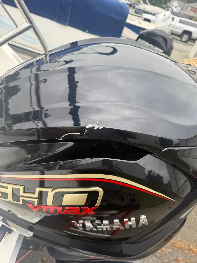 Slide: The Image of Damaged Yamaha VMAX SHO outboard motor on a 2022 Hurricane SD 2486 boat. - 26