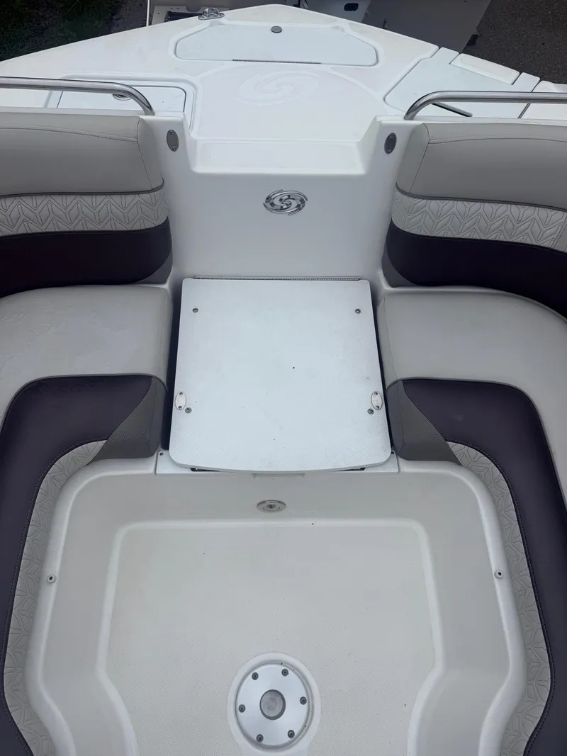 Slide: The Image of 2022 Hurricane SD 2486 boat interior with cushioned seating and storage area. - 3