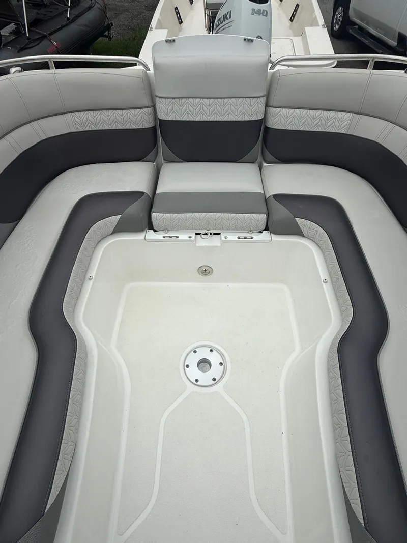 Slide: The Image of 2022 Hurricane SD 2486 boat interior with gray and white seating arrangement. - 5