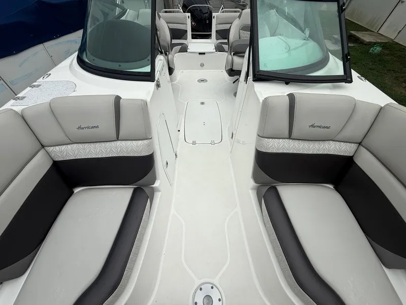 Slide: The Image of 2022 Hurricane SD 2486 boat interior with spacious seating and modern design. - 8