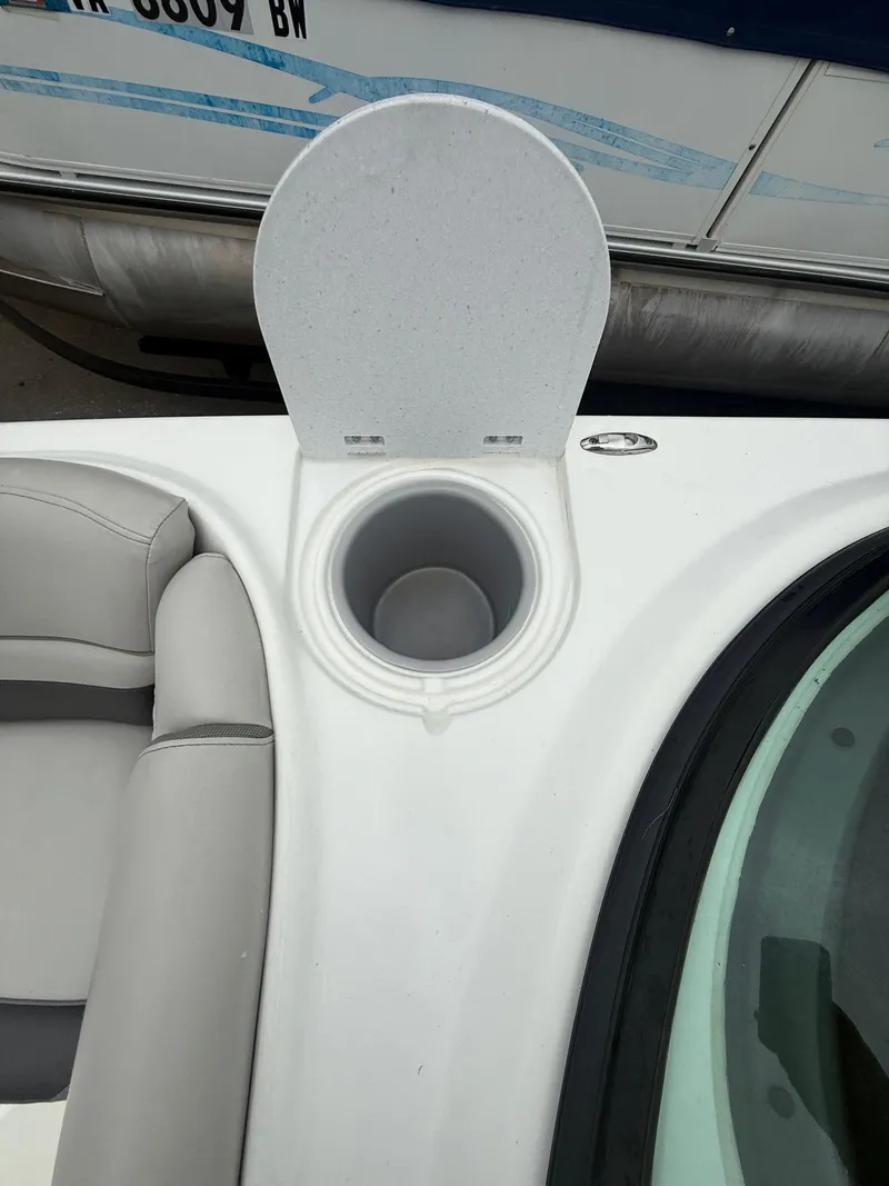 Slide: The Image of 2022 Hurricane SD 2486 boat cup holder and seating area. - 9