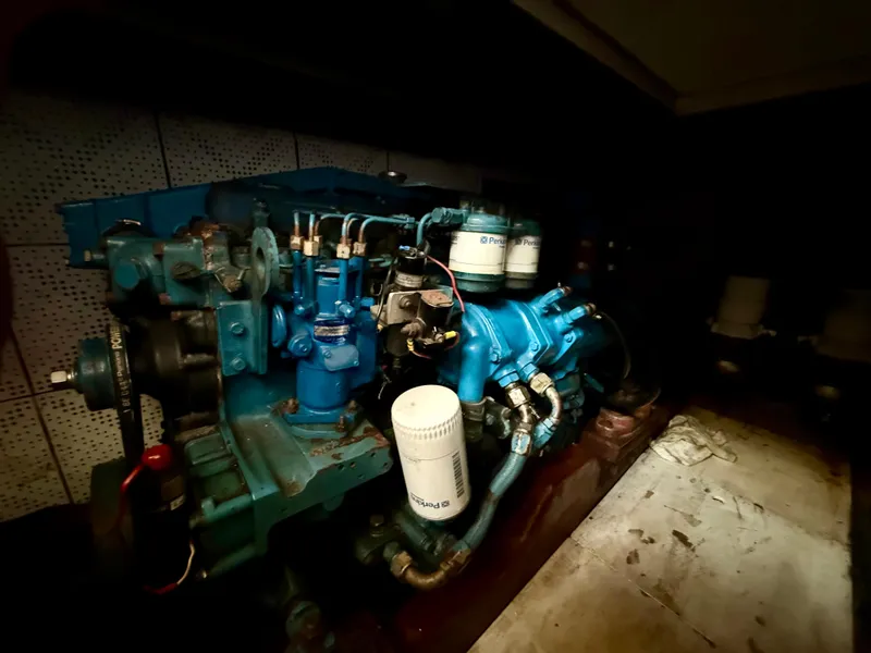 Slide: The Image of Engine room of 1981 DeFever Passagemaker with Perkins marine engine. - 27