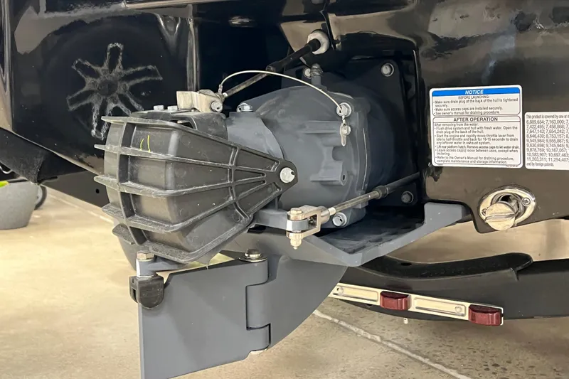 Slide: The Image of Close-up of 2025 Yamaha Boats AR190 engine component with safety instructions. - 13