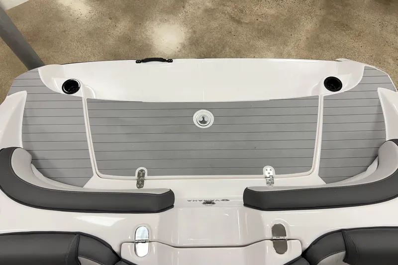 Slide: The Image of 2025 Yamaha Boats AR190 swim platform with gray decking and cup holders. - 6