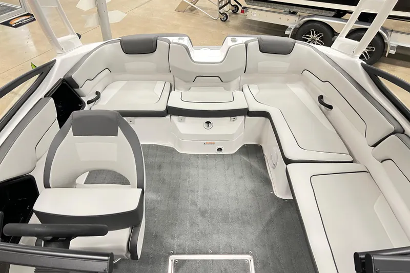 Slide: The Image of 2025 Yamaha Boats AR190 interior with spacious seating and modern design. - 7