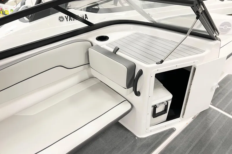 Slide: The Image of 2025 Yamaha Boats AR190 interior with seating and storage compartment. - 8