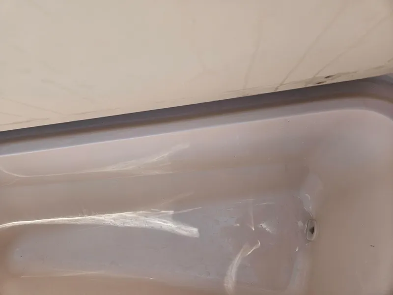 Slide: The Image of Interior view of a 2012 Grady-White Freedom 205 boat compartment. - 24