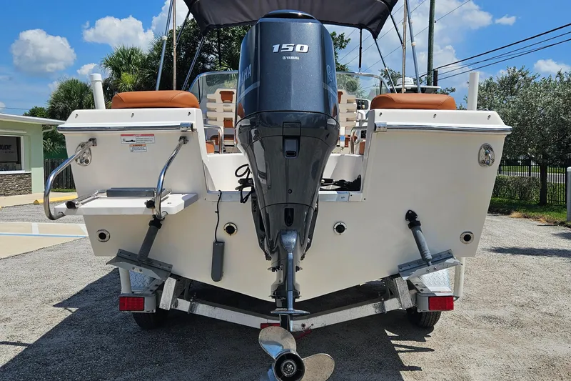 Slide: The Image of 2012 Grady-White Freedom 205 boat with Yamaha 150 engine, parked on trailer. - 6