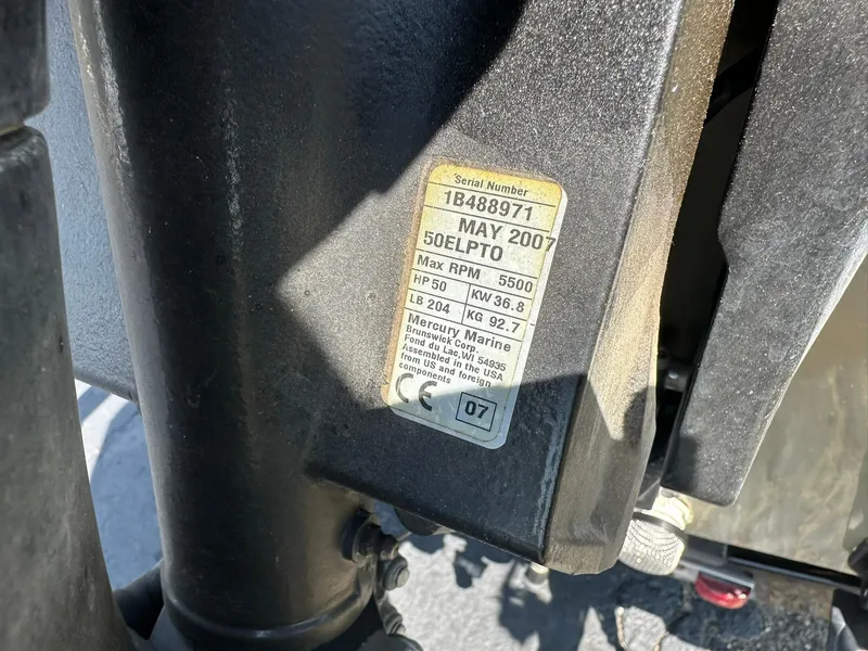 Slide: The Image of Close-up of a 2007 Mercury Marine engine label on a Lowe Fishing Machine FM165S. - 31