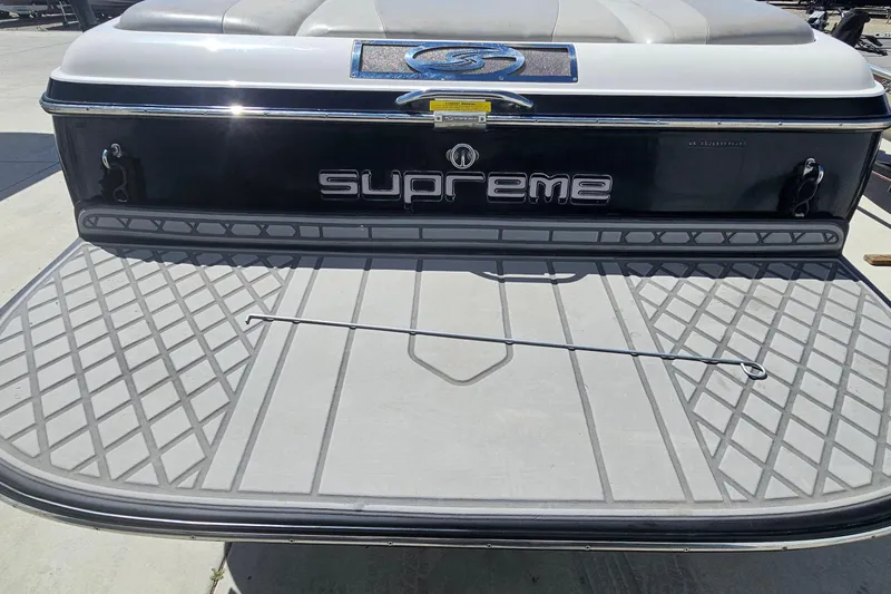 Slide: The Image of Rear view of a 2007 Supreme V232 boat with a swim platform. - 27