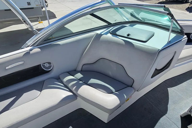 Slide: The Image of 2007 Supreme V232 boat interior with gray seating and speaker detail. - 31