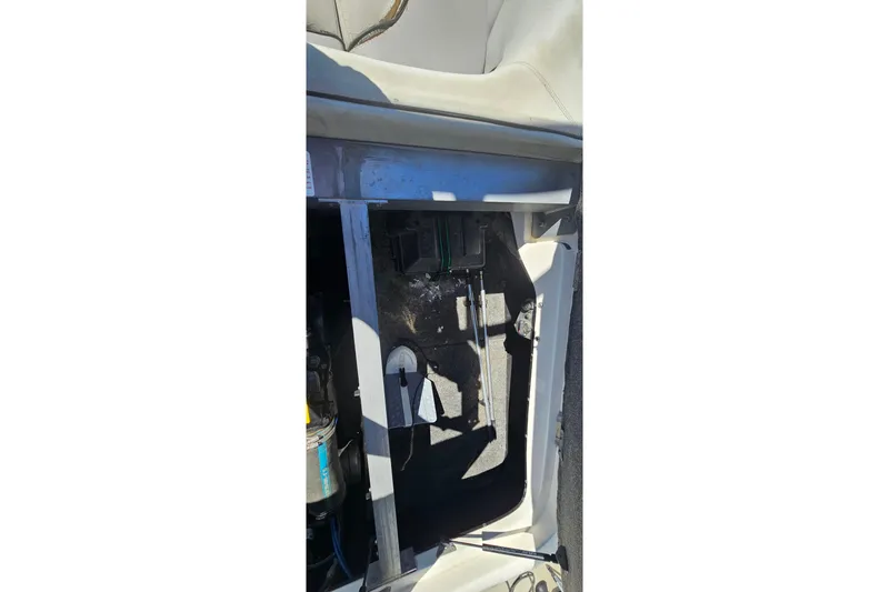 Slide: The Image of Interior view of a 2007 Supreme V232 boat, showing mechanical components. - 40