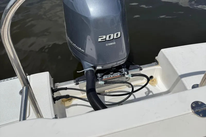 Slide: The Image of 2018 Robalo R222 Explorer with Yamaha 200 outboard motor and SeaStar steering system. - 14
