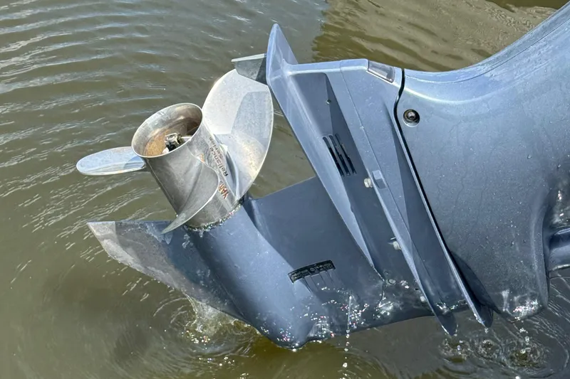 Slide: The Image of Outboard motor propeller of 2018 Robalo R222 Explorer in water. - 17