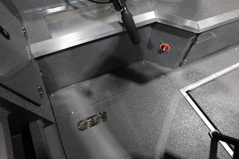 Slide: The Image of Interior view of 2025 Thunder Jet 209 Rush OT boat, showcasing sleek design and controls. - 19