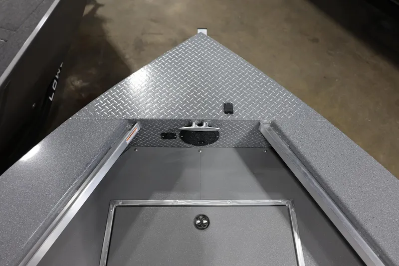 Slide: The Image of Bow of 2025 Thunder Jet 209 Rush OT boat with diamond plate detail. - 7