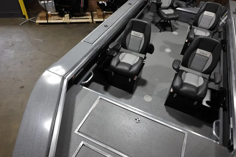 Slide: The Image of 2025 Thunder Jet 209 Rush OT boat interior with four cushioned seats. - 9