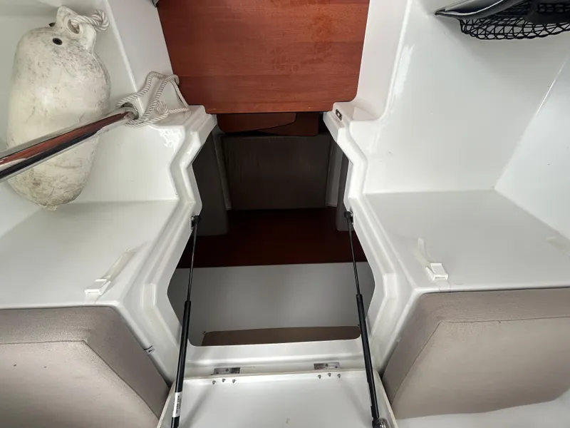 Slide: The Image of Interior view of 2015 Jeanneau Merry Fisher 855 Marlin boat, featuring seating and storage. - 14