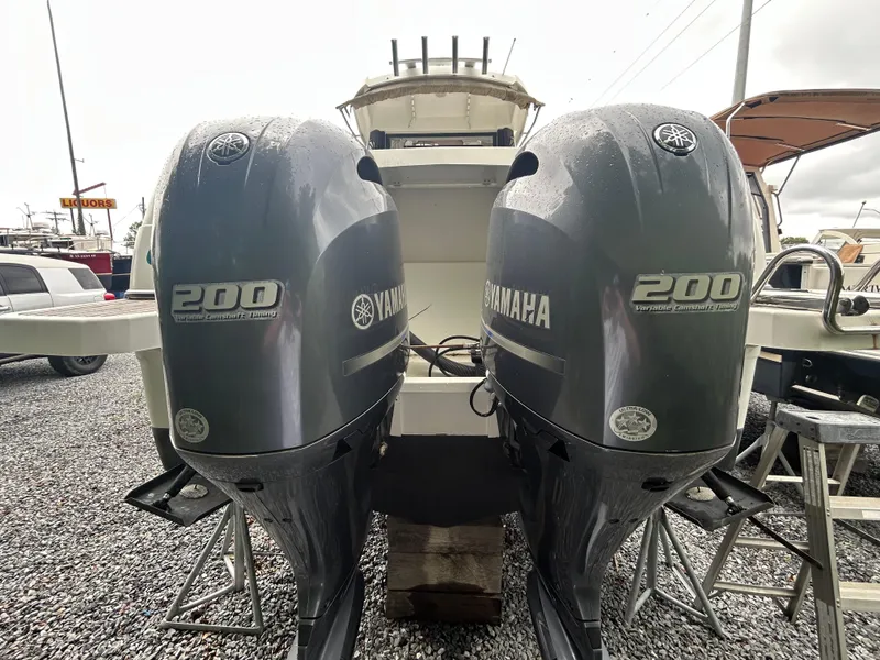 Slide: The Image of Twin Yamaha 200 engines on a 2015 Jeanneau Merry Fisher 855 Marlin boat. - 21