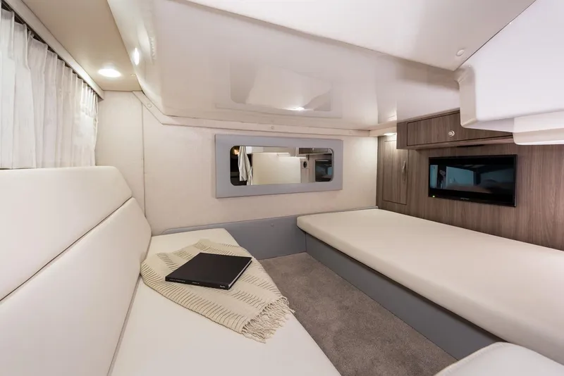 Slide: The Image of 2019 Regal 35 Sport Coupe interior cabin with modern furnishings. - 116