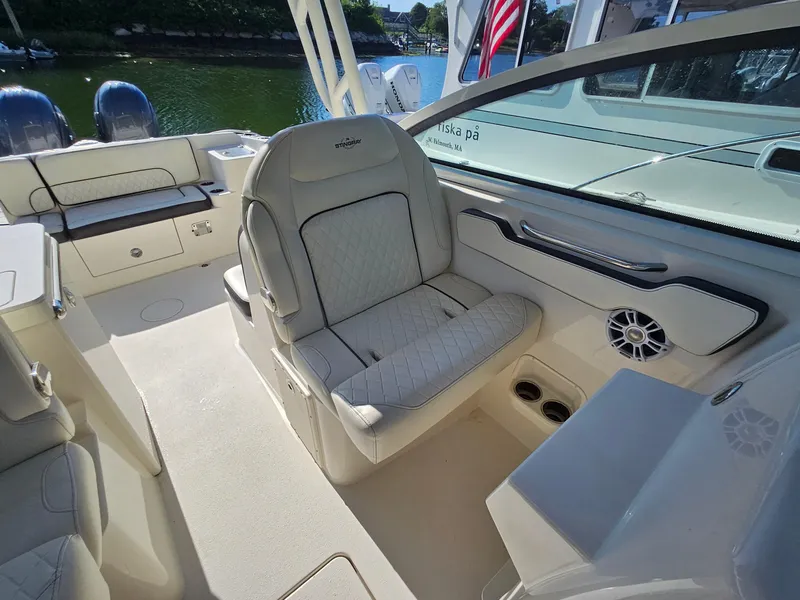 Slide: The Image of 2020 Stingray 269 DC boat interior with luxurious seating and modern design. - 13
